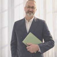 Tom Warman, Director of The Beta Theory